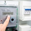 Modern electric meter close up view